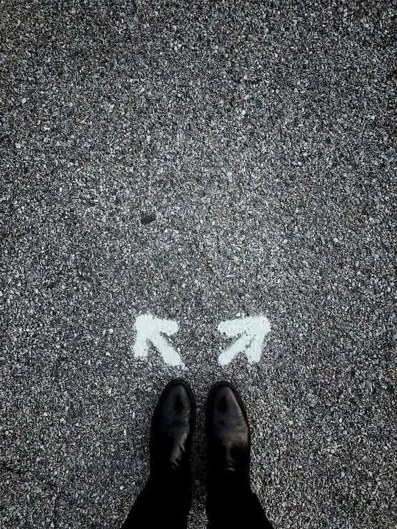 Black shoes on asphalt